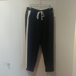 Andreas Jovine black cropped with stripe pants